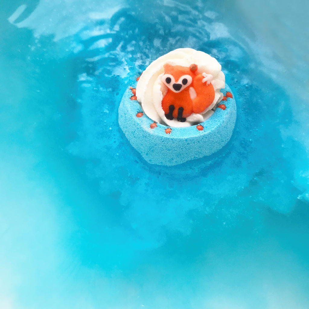 Foxy Loxy Bath Blaster fizzing, releasing its blue hue into the water